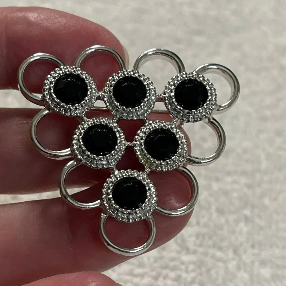 Vintage Sarah Coventry triangle open design black glass brooch
